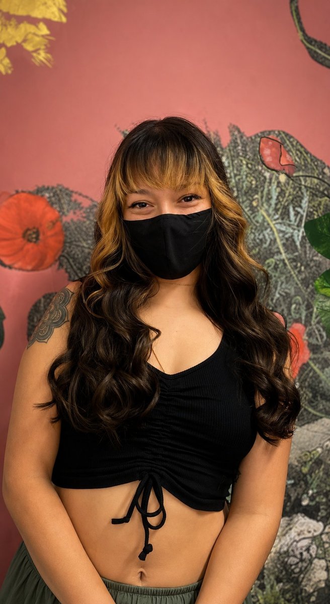 Long brunette with face-framing blonde highlights at Honeycomb
